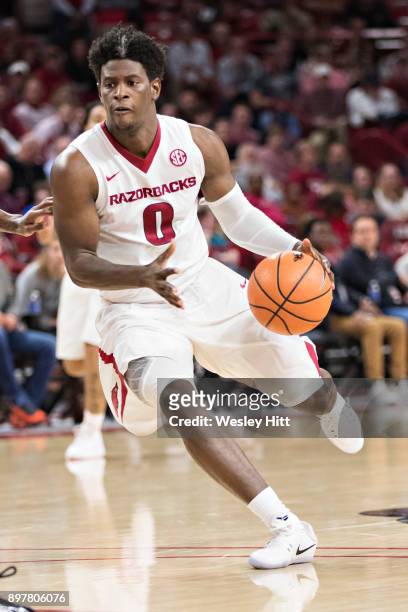 Jaylen Barford of the Arkansas Razorbacks drives to the middle during a game against the Oral Roberts Golden Eagles at Bud Walton Arena on December...