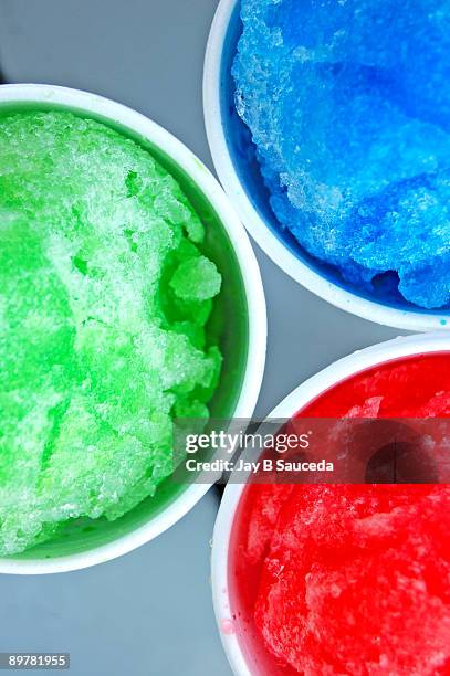 red green and blue snow cones - slush foto e immagini stock