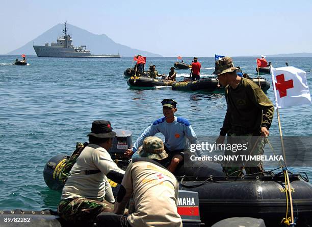 Indonesian marine soldiers inspect the water where around 2000 divers will participate in a diving competition off Manado, in north Sulawesi, in...