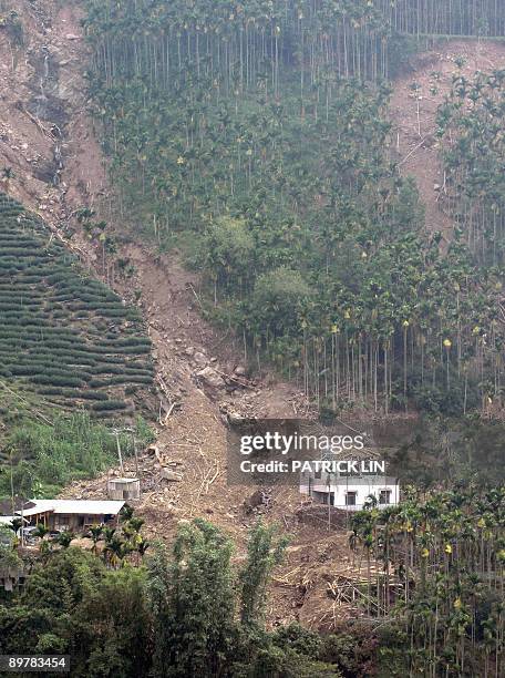 This photo shows a village damaged by mudslides during Typhoon Morakot in Meishan, Chiayi county, on August 14, 2009. Rescuers struggled to save...