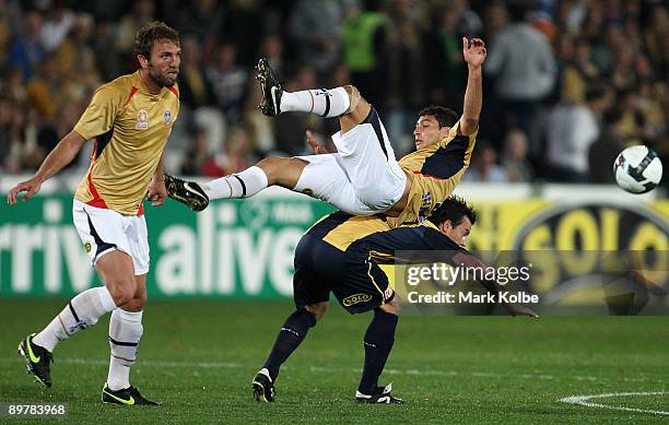 Adam D�Apuzzo of the Jets falls while competeing for the ball during the round two A-League match between the Central Coast Mariners and the...