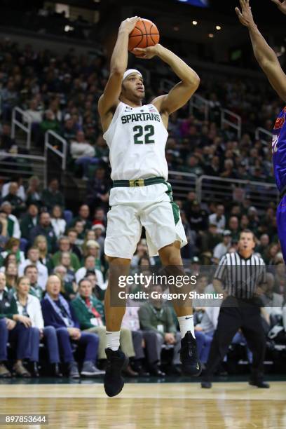 Miles Bridges of the Michigan State Spartans takes a first half shot while playing the Houston Baptist Huskies at the Jack T. Breslin Student Events...