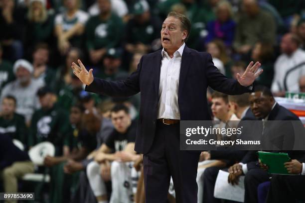 Head coach Tom Izzo of the Michigan State Spartans reacts on the bench while playing the Houston Baptist Huskies at the Jack T. Breslin Student...