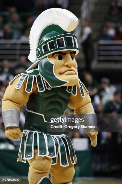 Michigan State Spartans mascot Sparty looks on while playing the Houston Baptist Huskies at the Jack T. Breslin Student Events Center on December 18,...