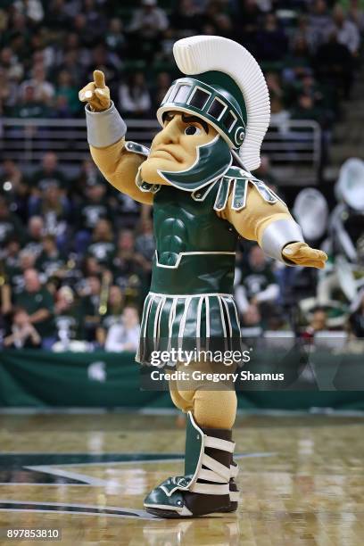 Michigan State Spartans mascot Sparty looks on while playing the Houston Baptist Huskies at the Jack T. Breslin Student Events Center on December 18,...