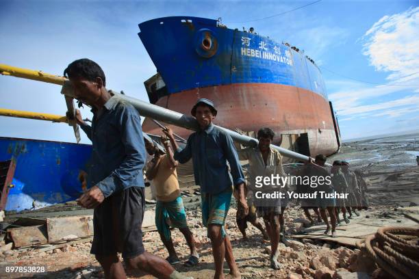 Ship breaking laborers working at Sitakundo ship breaking yard. The ship breaking industry at Sitakundo started its operation in 1960.Due to lower...