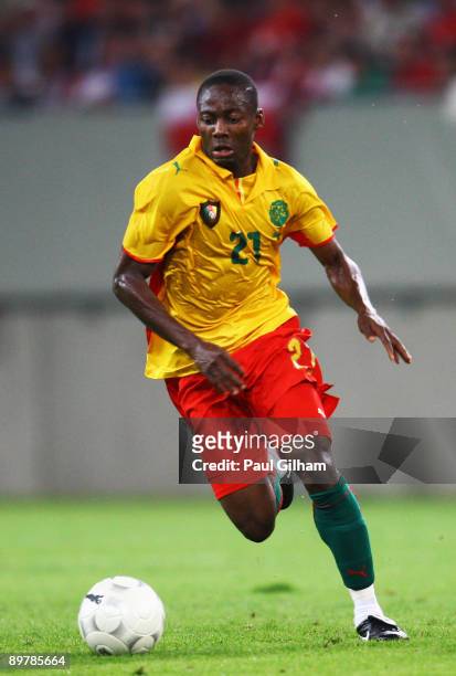 Eyong Enoh of Cameroon in action during the International Friendly match between Austria and Cameroon at Stadion Klagenfurt on August 12, 2009 in...