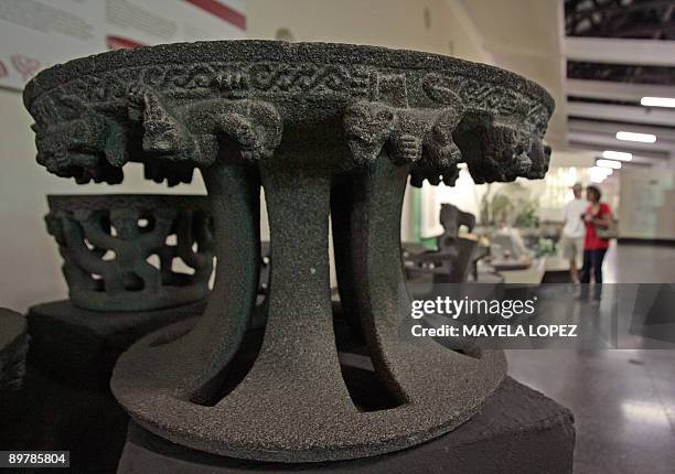 Stone table -probably used as a grave offering or as property for important people- is displayed on August 13 in the exhibition of pre-Columbian...