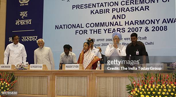 Home Minister P. Chidambaram, Vice-President Hamid Ansari, President Pratibha Patil and Prime Minister Manmohan Singh at the Presentation Ceremony of...