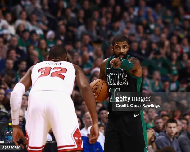 Kyrie Irving of the Boston Celtics calls a play during the second half of the game against the Chicago Bulls at TD Garden on December 23, 2017 in...