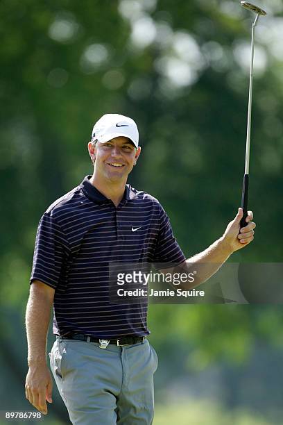 Lucas Glover celebrates a birdie putt on the 18th green during the second round of the 91st PGA Championship at Hazeltine National Golf Club on...