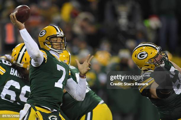 Brett Hundley of the Green Bay Packers drops back to pass during the second half against the Minnesota Vikings at Lambeau Field on December 23, 2017...