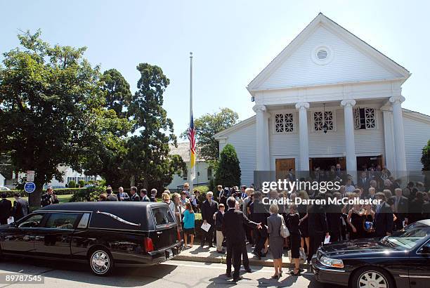 People congregate outside St. Francis Xavier Church following the funeral of Eunice Kennedy Shriver August 14, 2009 in Hyannis, Massachusetts....