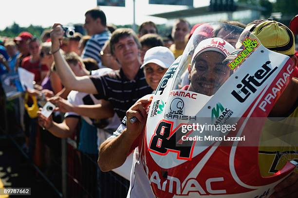Michel Fabrizio of Italy and Pramac Racing jokes during the pit walks of the MotoGP World Championship Grand Prix of Czech Republic on August 14,...