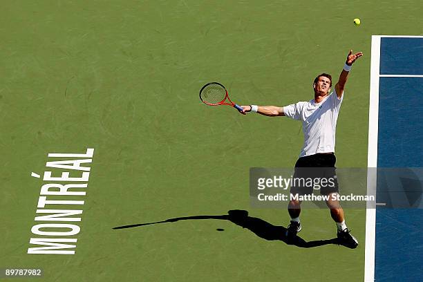 Andy Murray of Great Britain serves to Nikolay Davydenko of Russia during the quarterfinals of the Rogers Cup at Uniprix Stadium on August 14, 2009...