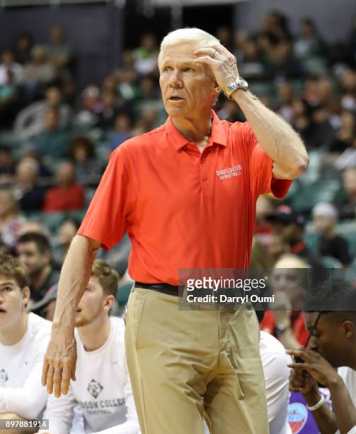 Head coach Bob McKillop of the Davidson Wildcats watches the action during the first half of the consolation round game of the Diamond Head Classic...