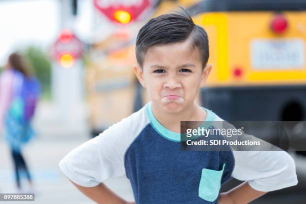 young boy is not ready for the first day of school - stubborn stock pictures, royalty-free photos & images
