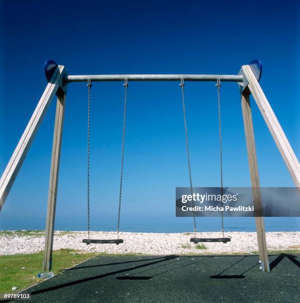 swingset - playground stock pictures, royalty-free photos & images