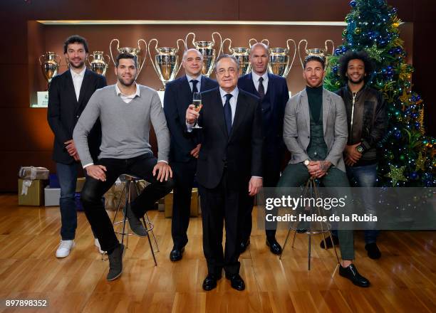 Basketball player Sergio Lull, basketball player Felipe Reyes, basketball head coach Pablo Laso, president Florentino Perez, head coach Zinedine...