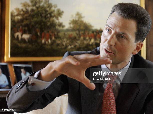 Liechtenstein's head of state Prince Alois gestures during an interview in the Vaduz castle, home of the Liechtenstein family on August 14, 2009....