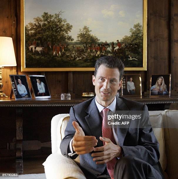 Liechtenstein's head of state Prince Alois gestures during an interview in the Vaduz castle, home of the Liechtenstein family on August 14, 2009....