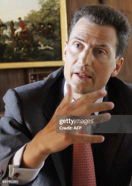 Liechtenstein's head of state Prince Alois gestures during an interview in the Vaduz castle, home of the Liechtenstein family on August 14, 2009....