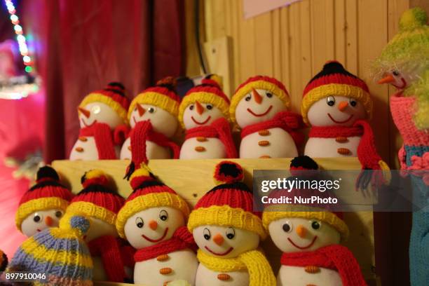 Snowmen in the german national colors. Last Day of the Christmas Market at &quot;Chinesischer Turm&quot; in Munich on December 23, 2017.