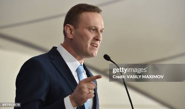 Russian opposition leader Alexey Navalny delivers a speech during a meeting with his supporters in Moscow on December 24, 2017. - Alexei Navalny,...