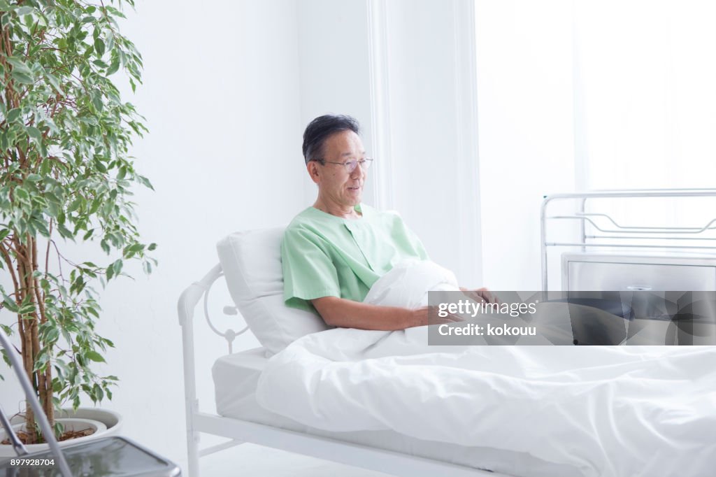 An old man in the hospital.