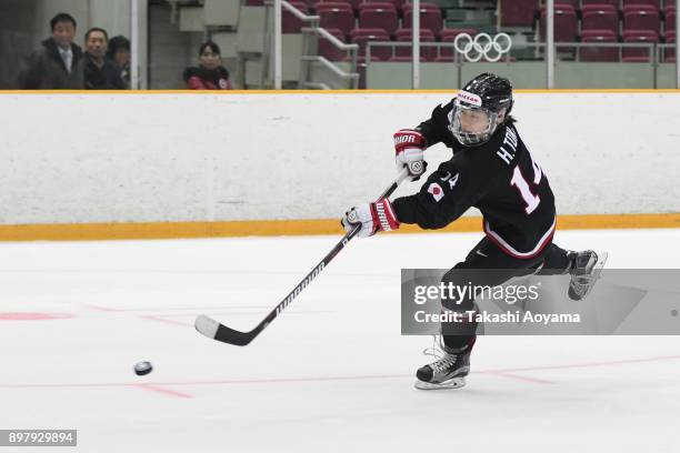 Haruka Toko of Japan takes a shot during a shoot out during the Women's ice hockey friendly match between Japan and Russia at Big Hat on December 24,...