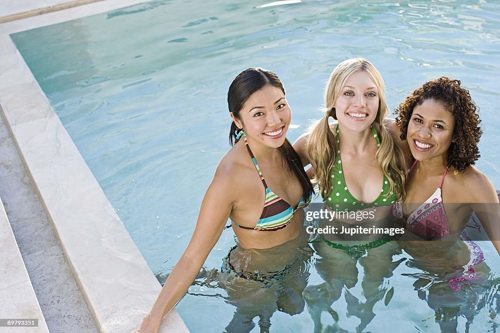 Portrait of smiling women in swimming pool