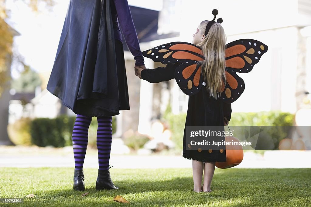 Girl and parent in Halloween costumes