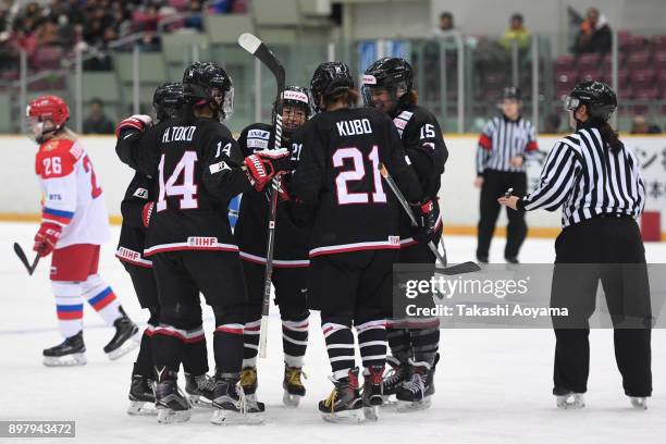 Ayaka Toko of Japan celebrates a second period goal with teammates during the Women's ice hockey friendly match between Japan and Russia at Big Hat...