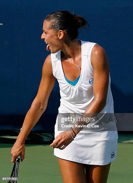 Flavia Pennetta of Italy reacts after defeating Daniela Hantuchova of Slovakia on Day 5 of the Western & Southern Financial Group Women's Open on...