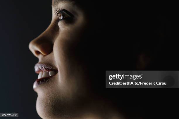 young woman's face, profile, close-up - face projection stock pictures, royalty-free photos & images
