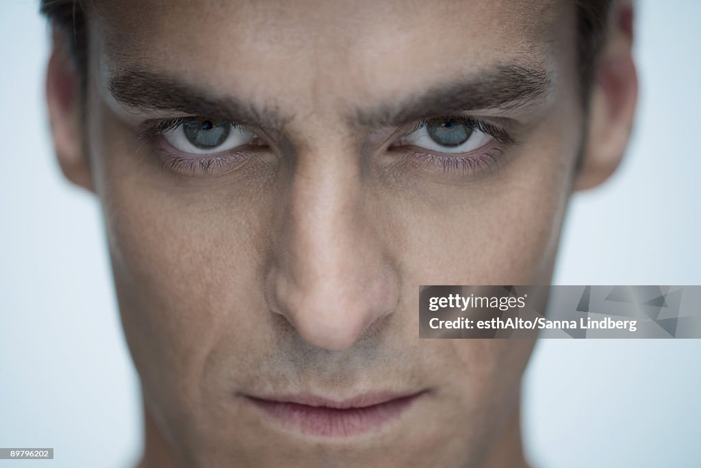 Man staring at camera, close-up