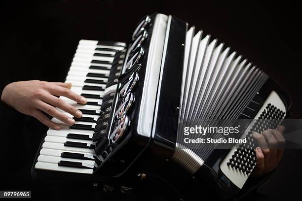 human hands playing an accordion - bandoneon bildbanksfoton och bilder