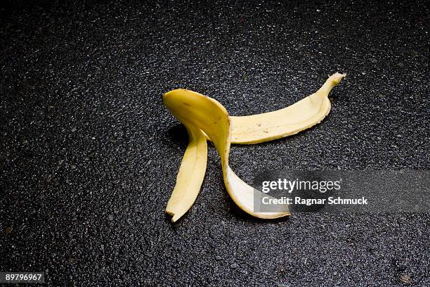 a discarded banana peel - banana peel stock pictures, royalty-free photos & images