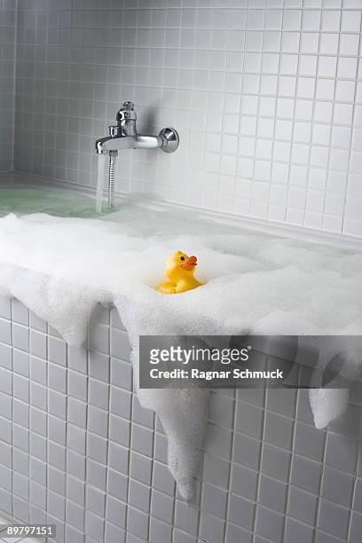 an overflowing bubble bath - bathtub bildbanksfoton och bilder