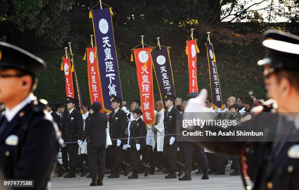 Well-wishers gather to celebrate Emperor Akihito's 84th birthday at the Imperial Palace on December 23, 2017 in Tokyo, Japan.