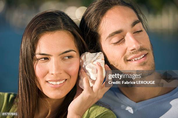 Listen Sea Shell Photos and Premium High Res Pictures - Getty Images