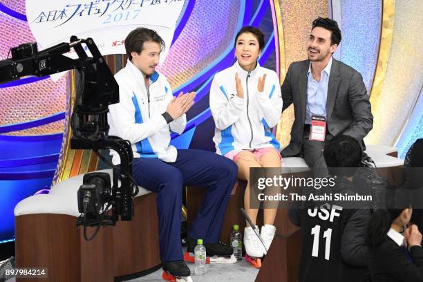 Kana Muramoto and Chris Reed react at the kiss and cry after competing in the Ice Dance Free Dance during day four of the 86th All Japan Figure...