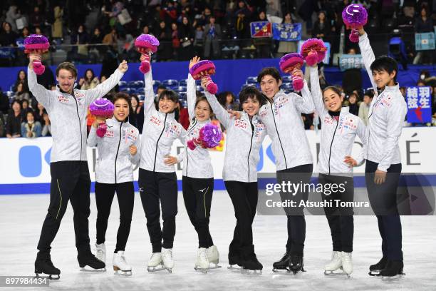 Kana Muramoto and Chris Reed, Kaori Sakamoto, Satoko Miyahara, Shoma Uno, Keiji Tanaka, Miu Suzaki and Ryuichi Kihara of Japan pose for photo session...