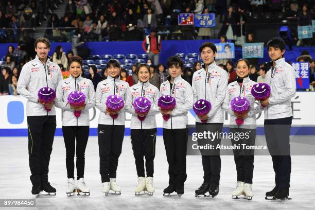 Kana Muramoto and Chris Reed, Kaori Sakamoto, Satoko Miyahara, Shoma Uno, Keiji Tanaka, Miu Suzaki and Ryuichi Kihara of Japan pose for photo session...