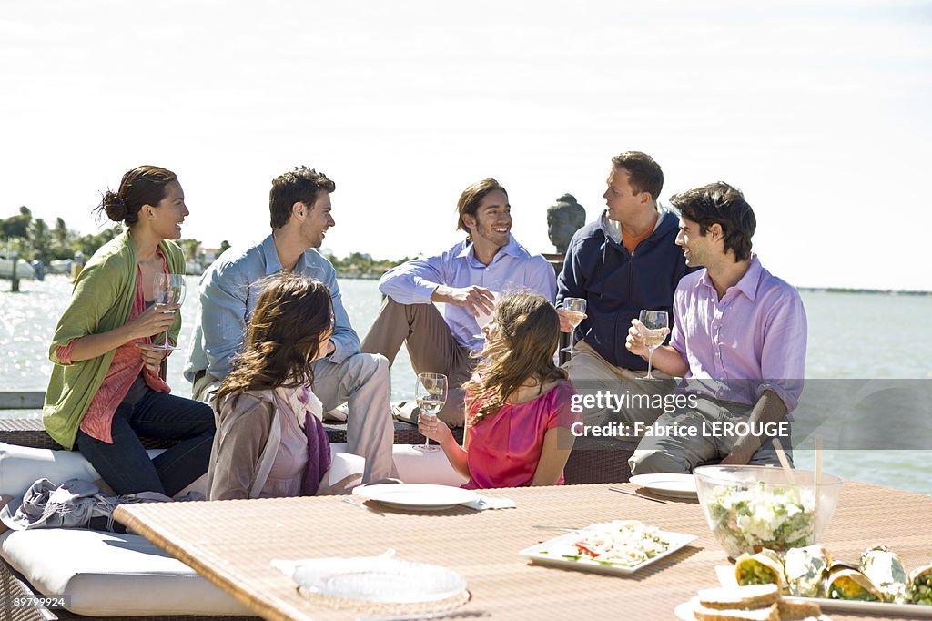 Group of friends enjoying drinks at a party