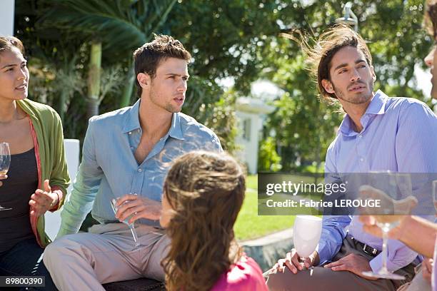 five friends enjoying drinks at a party - long hair wind stock pictures, royalty-free photos & images