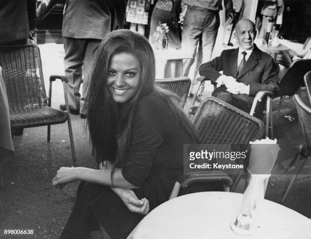Italian-Tunisian actress Claudia Cardinale as a gypsy woman during the filming of 'The Fairy', later titled 'Le Fate' or 'The Queens', Italy, June...