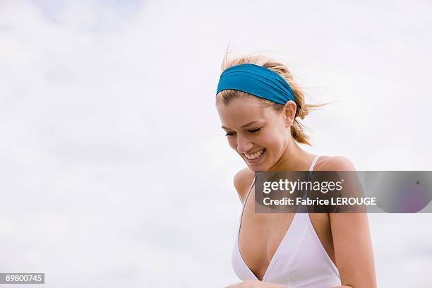 close-up of a woman smiling - decollete photos et images de collection