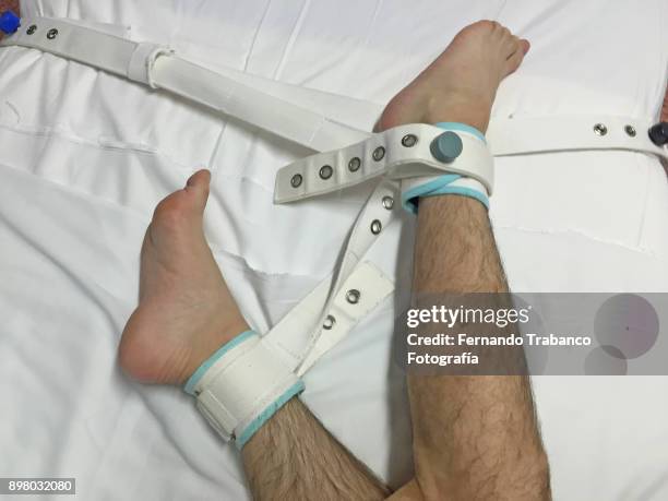 mental disorder - feet torture stock-fotos und bilder