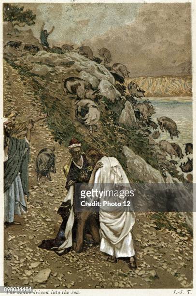 Jesus casting devils out of kneeling man, and putting them into Gaderine Swine who plunge over the cliff as if possessed. From JJ Tissot "Life of our...